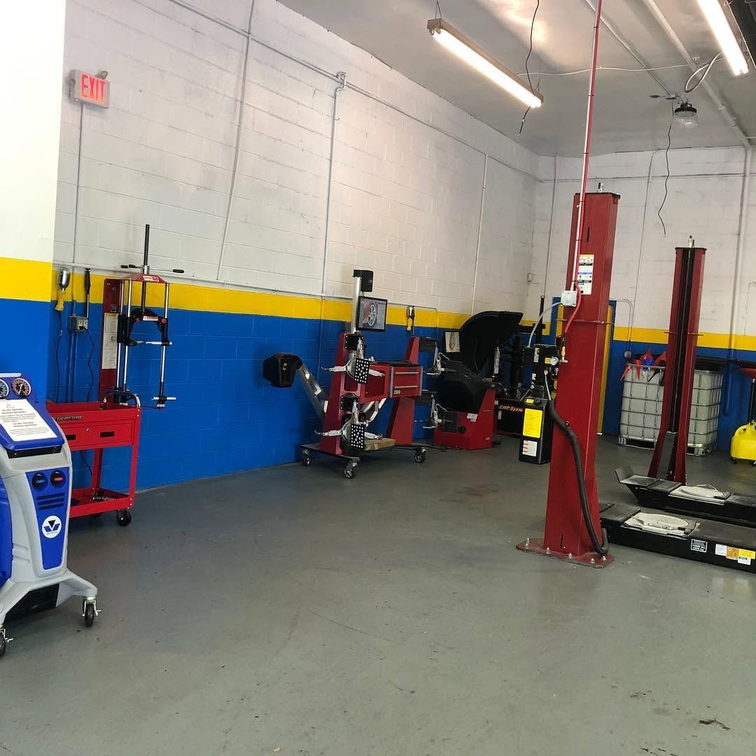 Marlboro Auto Center shop floor with lifts and tire equipment
