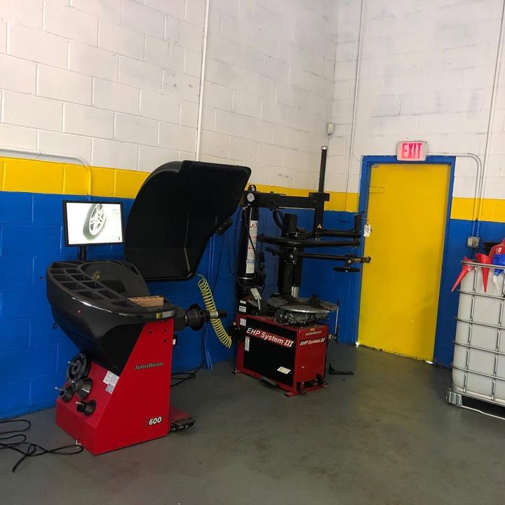 Tire changer and wheel balancer
